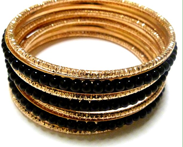 Lot de 7 bracelets en Métal (3 noirs et 4 dorés)